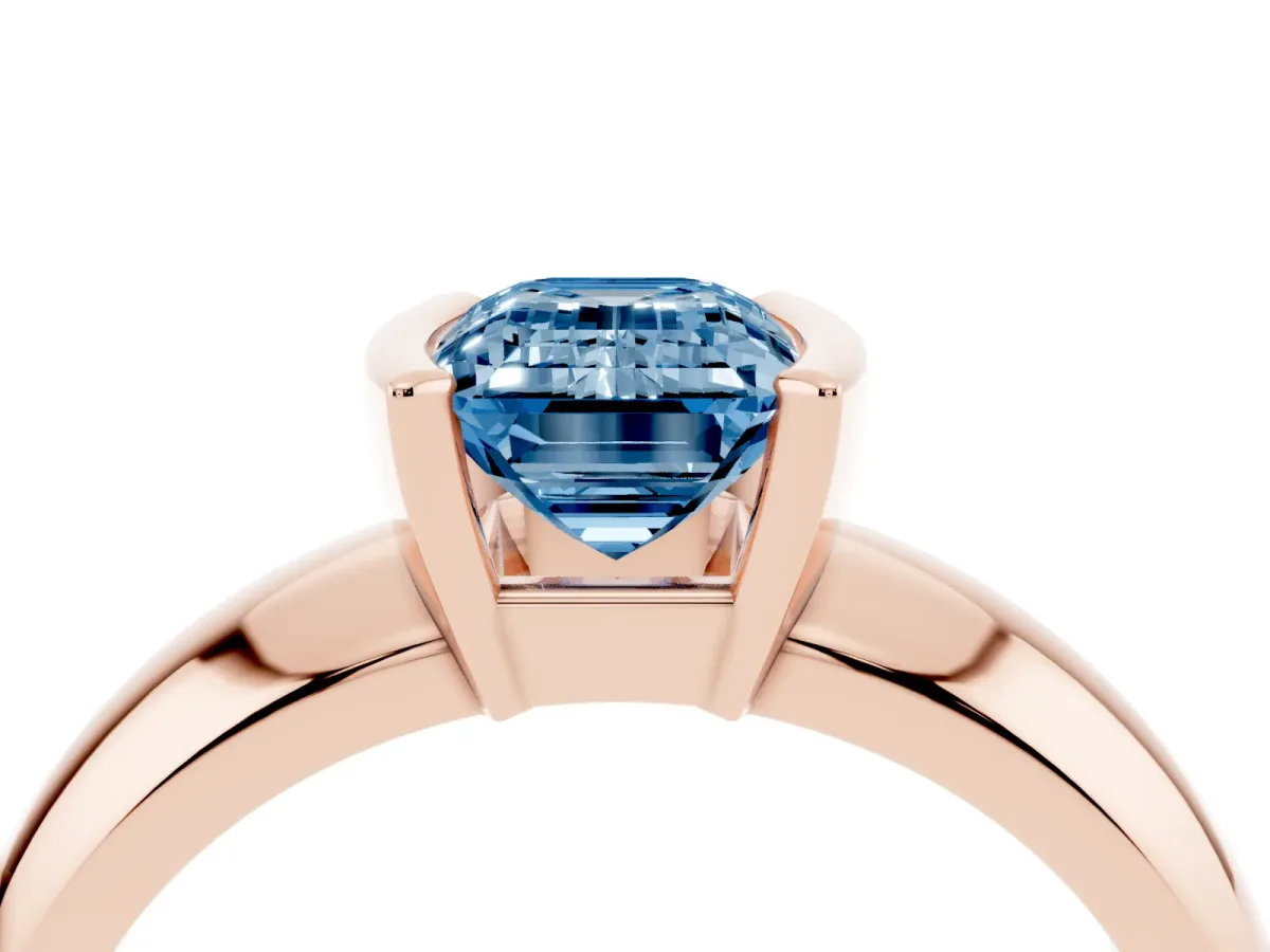 Fancy Blue Emerald Cut Solitaire Tension Set Diamond Ring with Wide Band Rose gold