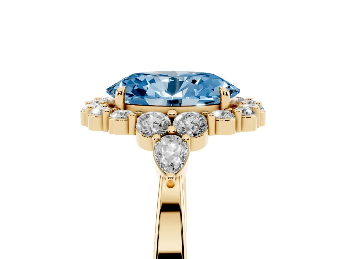 Fancy Blue Oval Cut Diamond Halo Ring with Pear Side Stones and Prong Setting Yellow gold