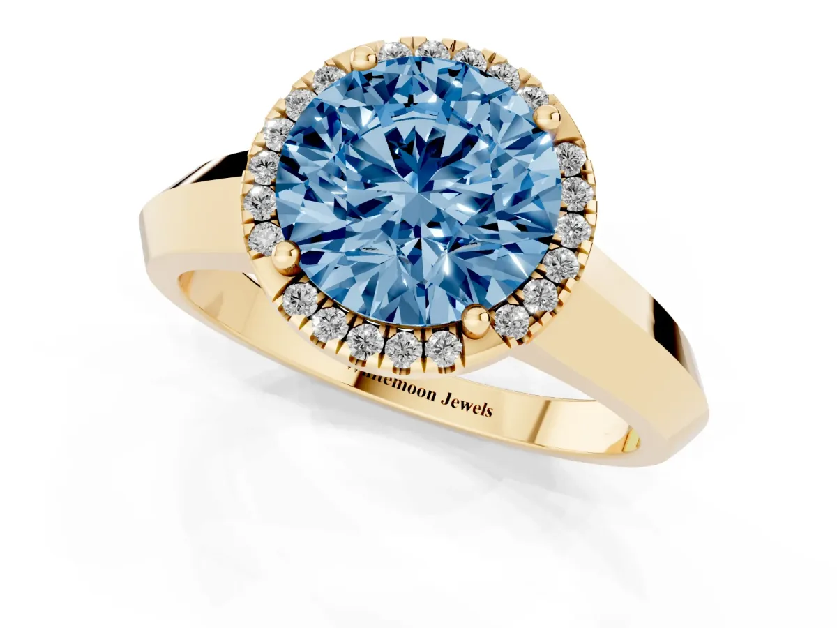 Fancy Blue Round Cut Halo Diamond Ring with Cathedral Band and Four-Prong Setting Yellow gold