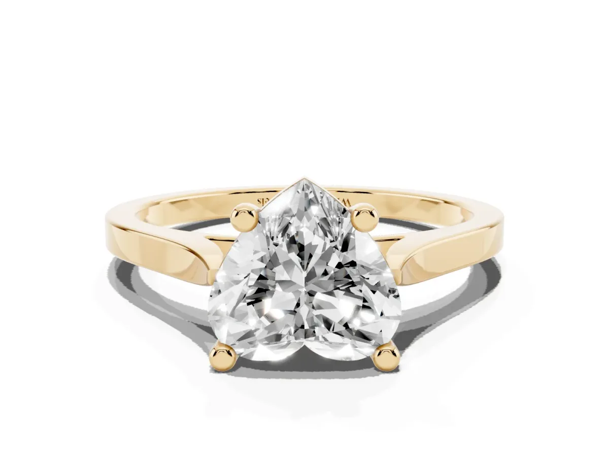 Heart Cut Solitaire Diamond Ring with Four-Prong Setting and Tapered Band Yellow gold