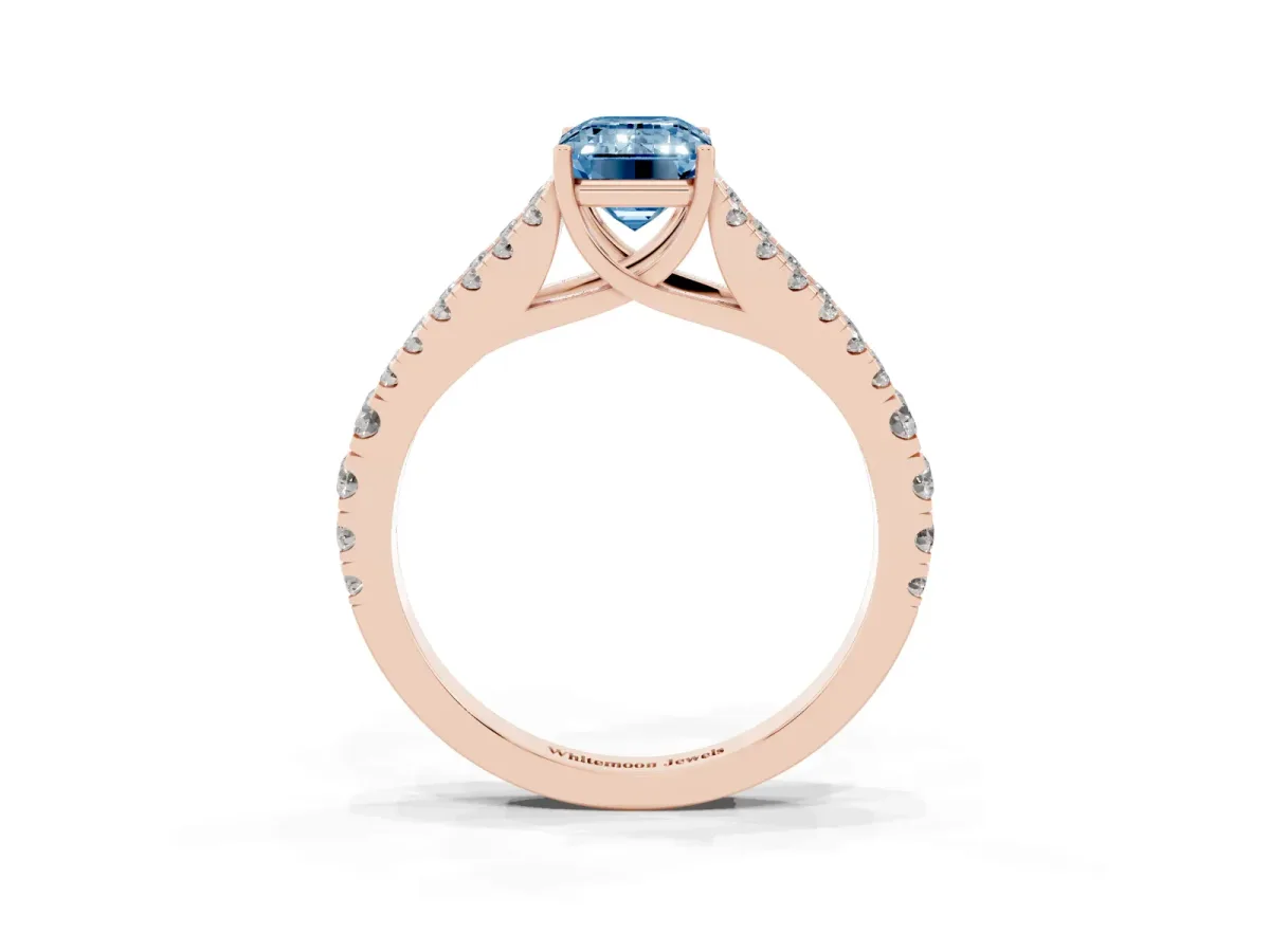 Fancy Blue Emerald Cut Diamond Split Shank Pavé Engagement Ring with Four-Prong Setting Rose gold