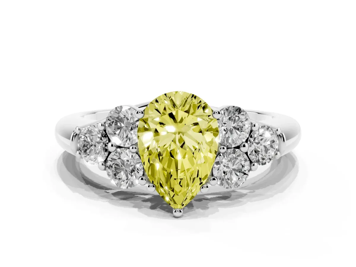 Fancy Yellow Pear Cut Cut Diamond Cluster Ring with Round Accent Stones and Prong Setting on a Classic Band Silver