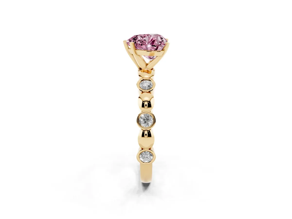 Fancy Pink Heart Cut Solitaire Bezel-Set Diamond Ring with Beaded Band and Four-Prong Setting Yellow gold