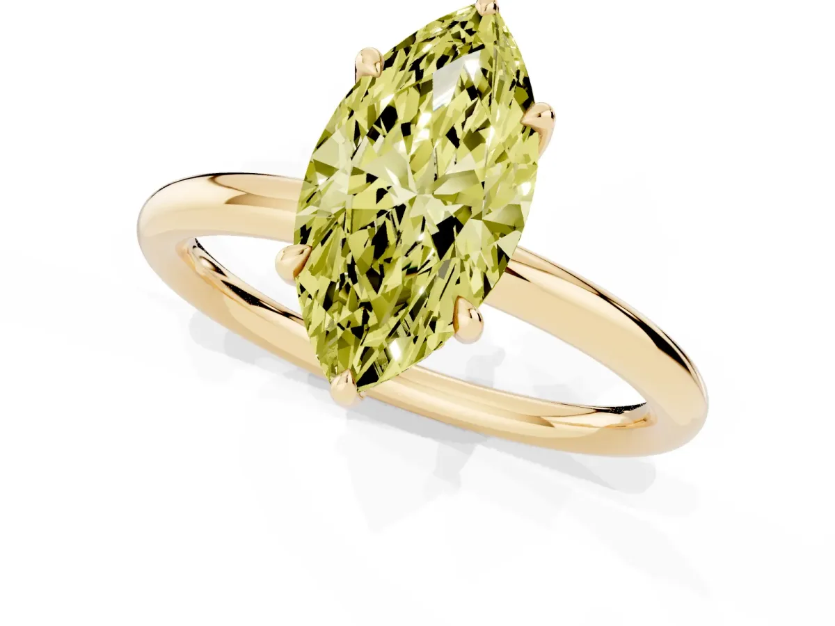 Fancy Yellow Marquise Cut Diamond Solitaire Ring with Thin Band and Four-Prong Setting Yellow gold