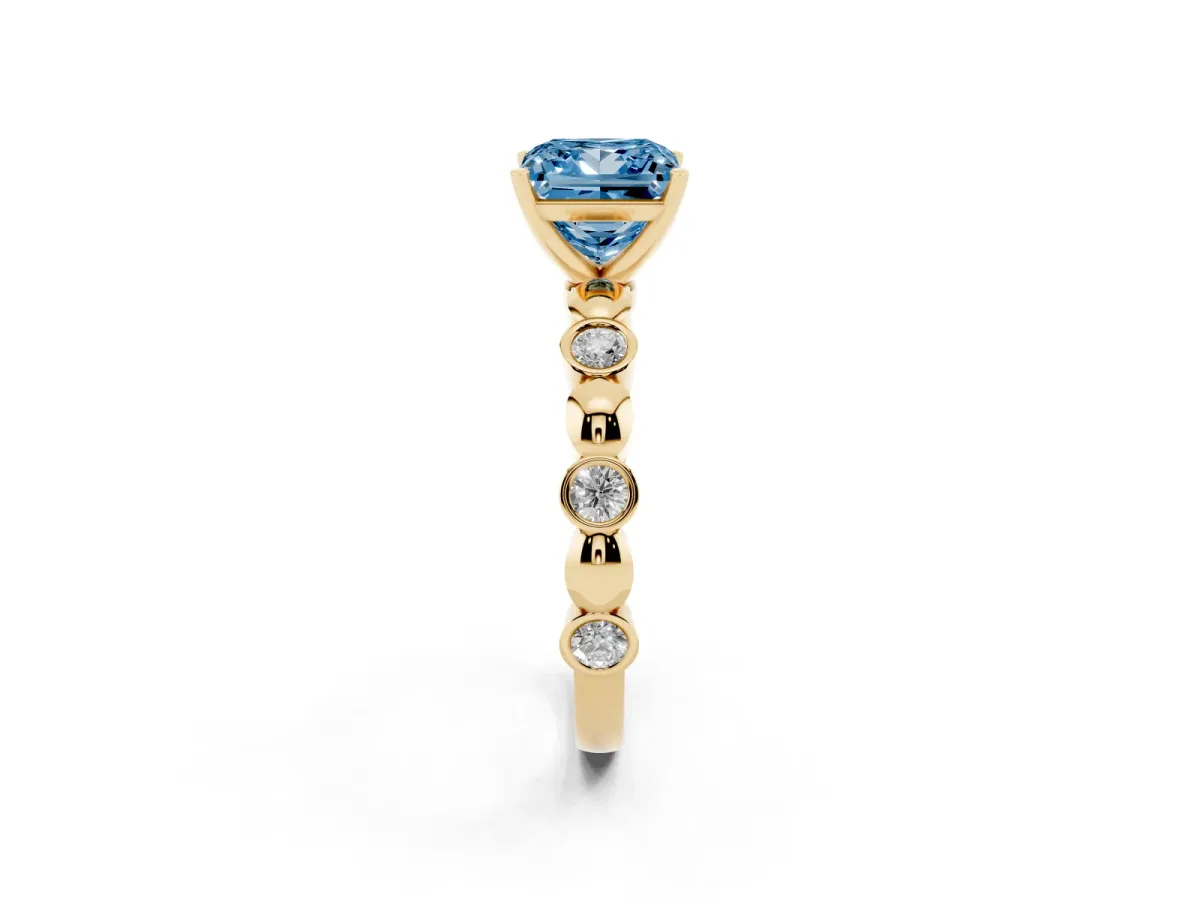 Fancy Blue Princess Cut Solitaire Bezel-Set Diamond Ring with Beaded Band and Four-Prong Setting Yellow gold