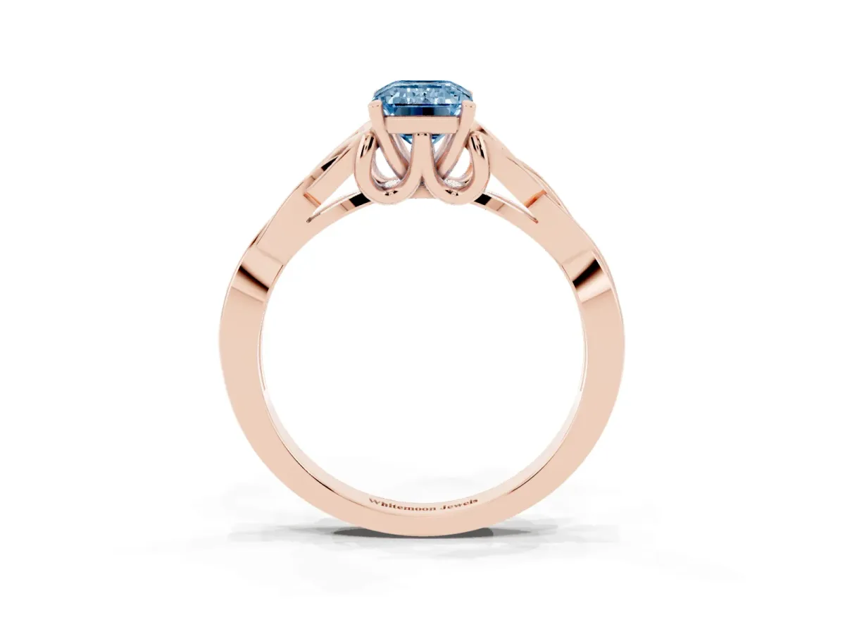 Fancy Blue Emerald Cut Diamond Solitaire Engagement Ring with Celtic Knot Band and Four-Prong Setting Rose gold