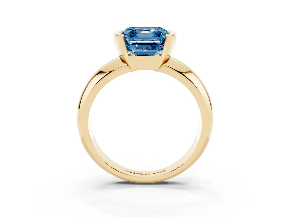 Fancy Blue Asscher Cut Solitaire Tension Set Diamond Ring with Wide Band Yellow gold