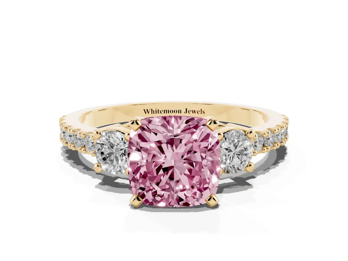Fancy Pink Cushion Cut Three-Stone Diamond Pavé Band with Prong Setting Yellow gold