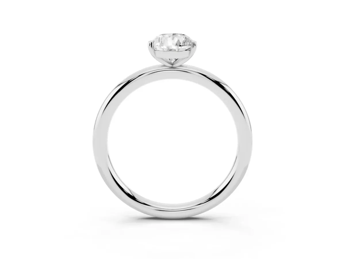 Pear Cut Solitaire Diamond Ring with Four-Prong Setting on a Plain Band Silver