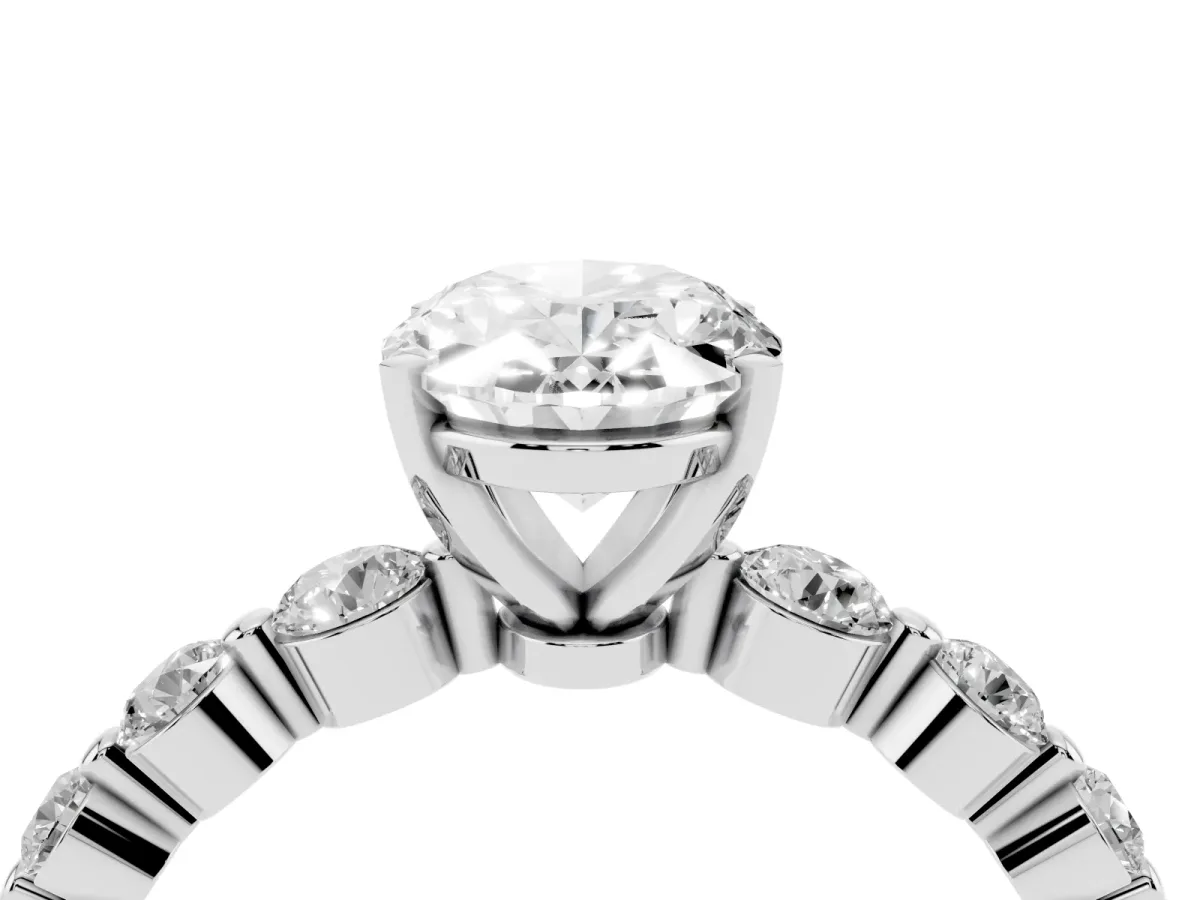 Oval Cut Solitaire Diamond Ring with Pave Band and Four-Prong Setting Silver