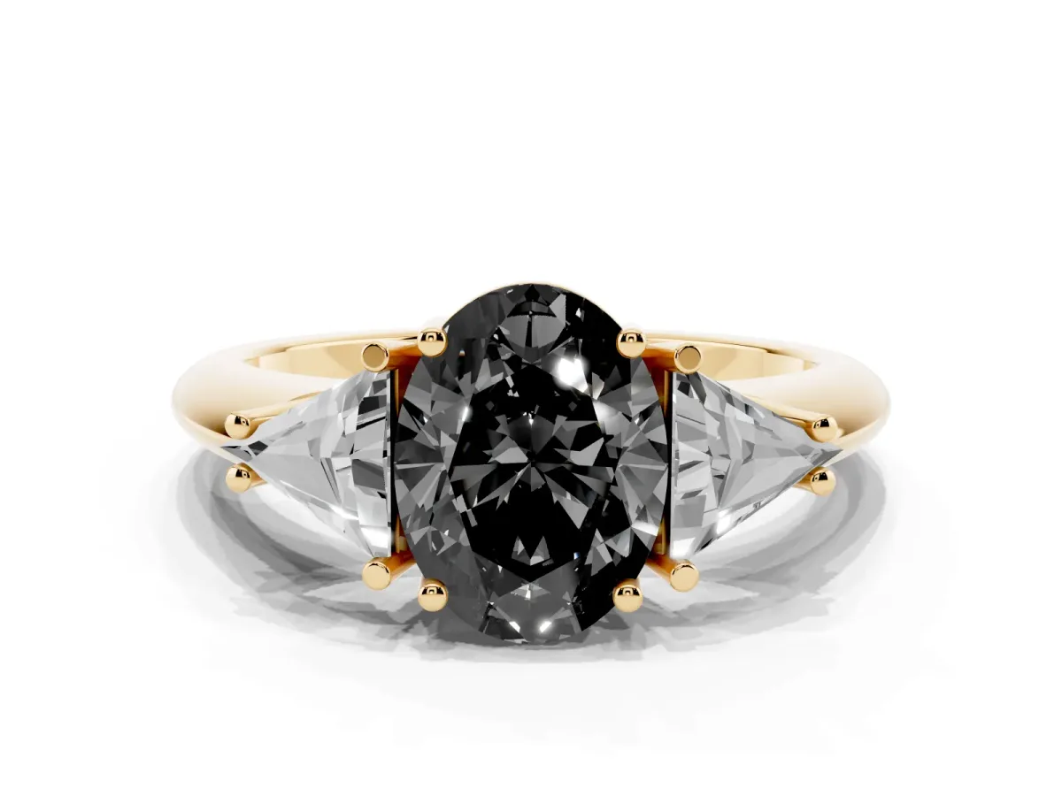 Fancy Black Three-Stone Oval Cut Diamond Engagement Ring with Trillion Side Stones and Prong Setting Yellow gold