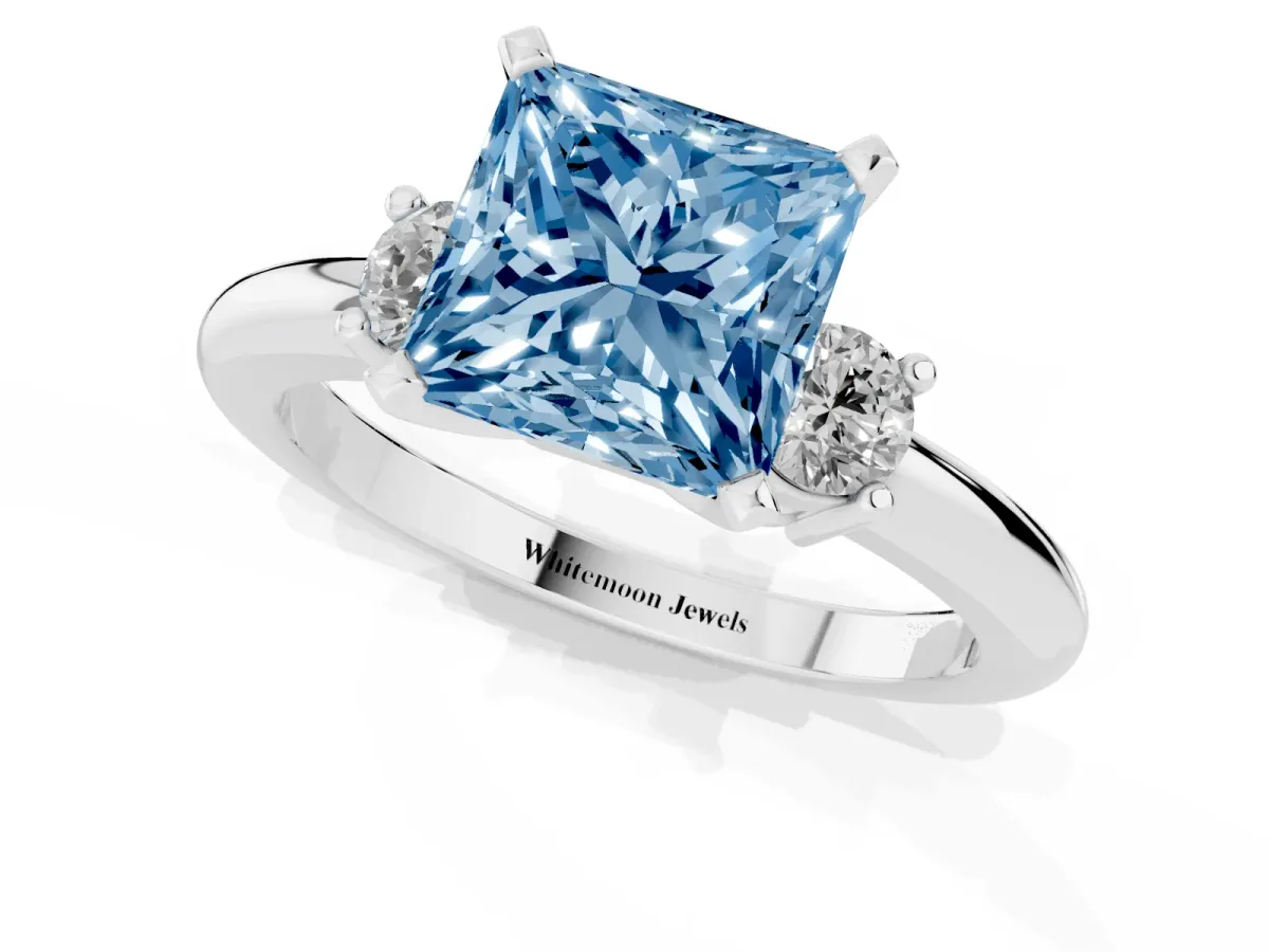 Fancy Blue Three-Stone Princess Cut Cut Diamond Solitaire with Prong Setting and Classic Band Platinum