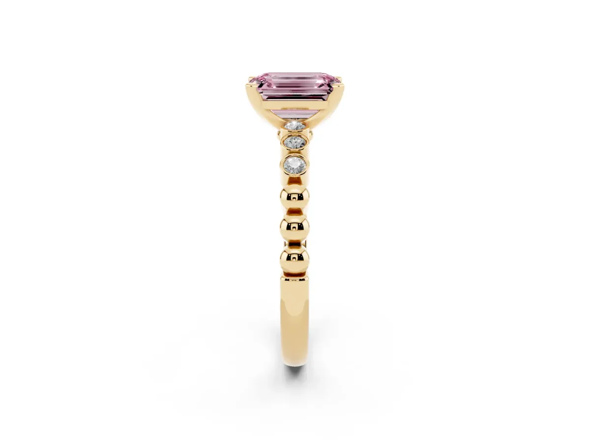 Fancy Pink Emerald Cut Solitaire Bezel Accent Diamond Engagement Ring with Beaded Band and Four-Prong Setting Yellow gold