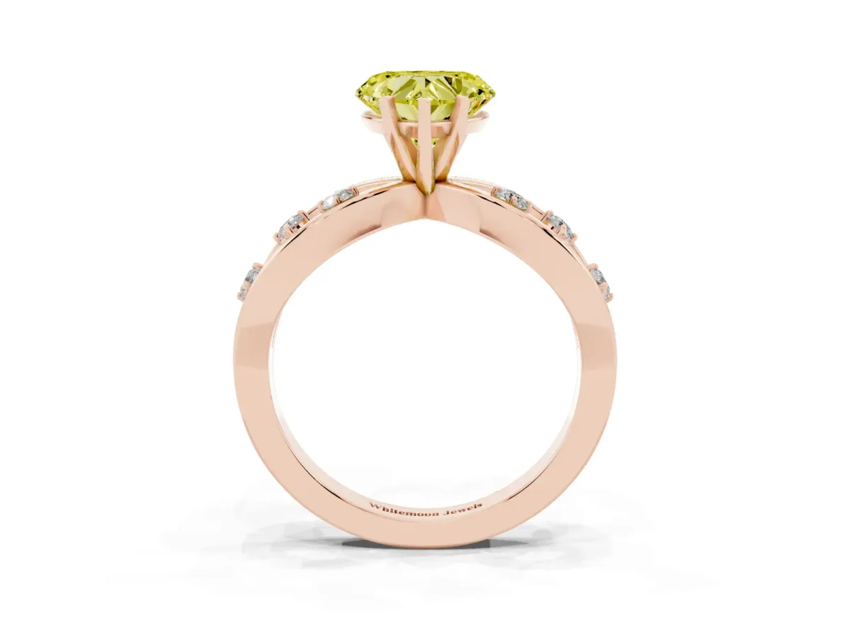 Fancy Yellow Heart Cut Cut Solitaire Diamond with Side Stones on Criss-Cross Band and Four-Prong Setting Rose gold