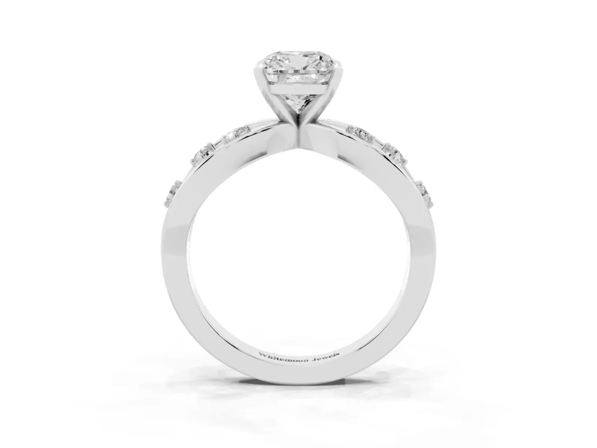 Cushion Cut Cut Solitaire Diamond with Side Stones on Criss-Cross Band and Four-Prong Setting Silver