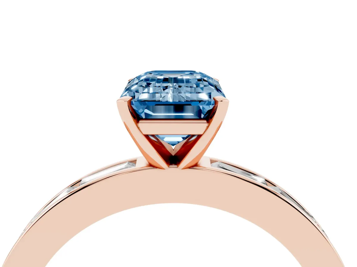 Fancy Blue Emerald Cut Solitaire Diamond Ring with Channel-Set Baguette Band and Four-Prong Setting Rose gold