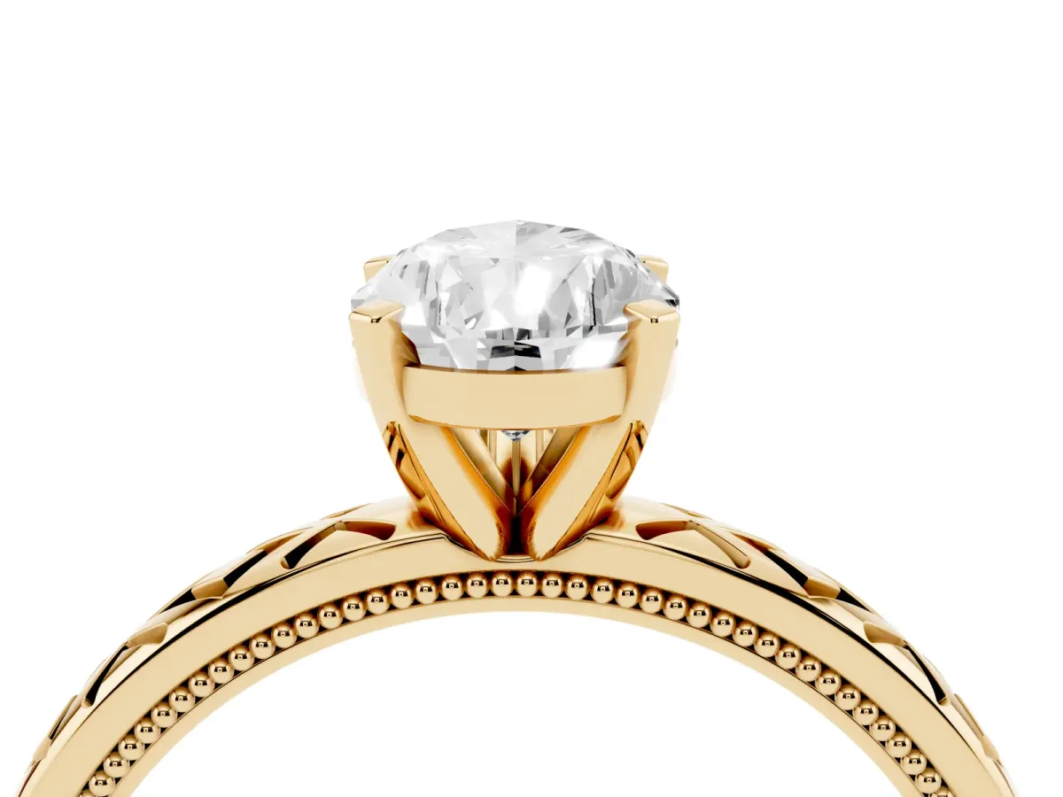 Pear Cut Solitaire Diamond Ring with Milgrain and Black Enamel X Pattern Band Yellow gold
