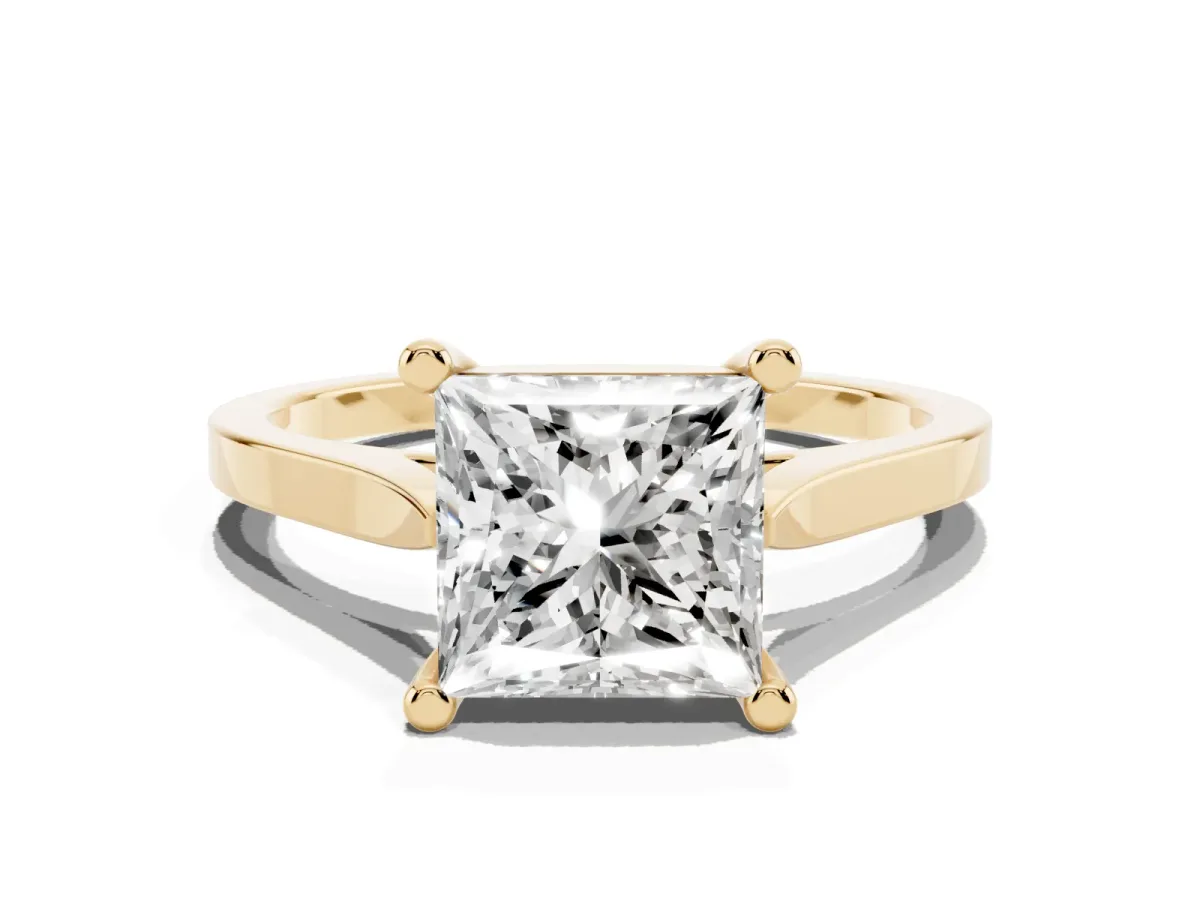 Princess Cut Solitaire Diamond Ring with Four-Prong Setting and Tapered Band Yellow gold