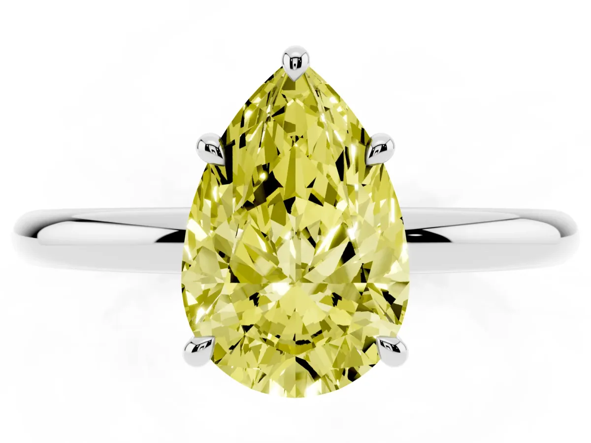 Fancy Yellow Pear Cut Diamond Solitaire Ring with Thin Band and Four-Prong Setting Silver