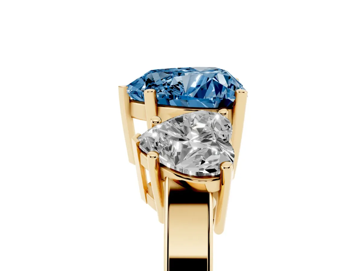 Fancy Blue Three-Stone Heart Cut Cut Diamond Engagement Ring with Flat Band and Four-Prong Setting Yellow gold