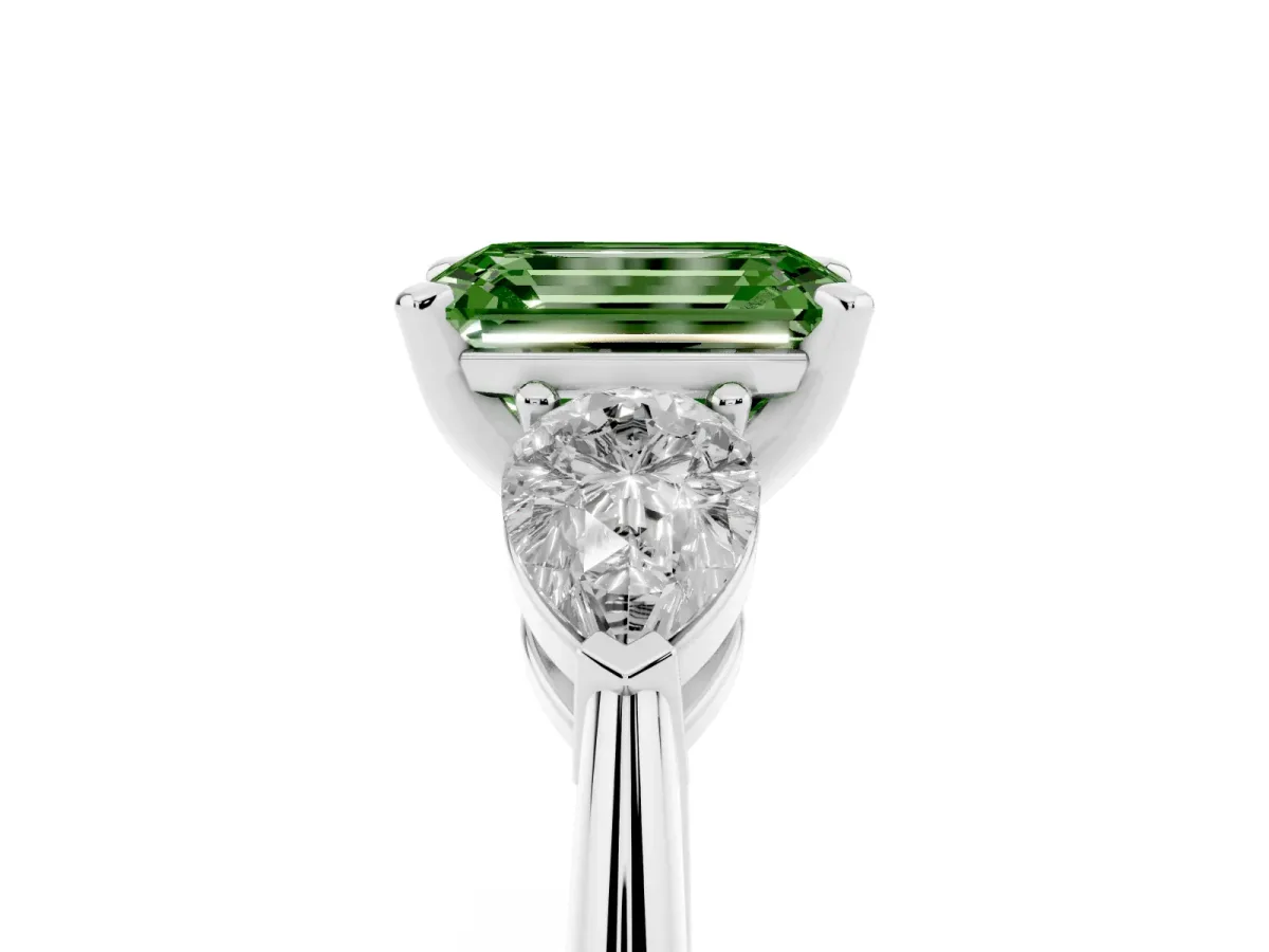 Fancy Green Three-Stone Emerald Cut Diamond Ring with Pear Side Stones and Four-Prong Setting Silver