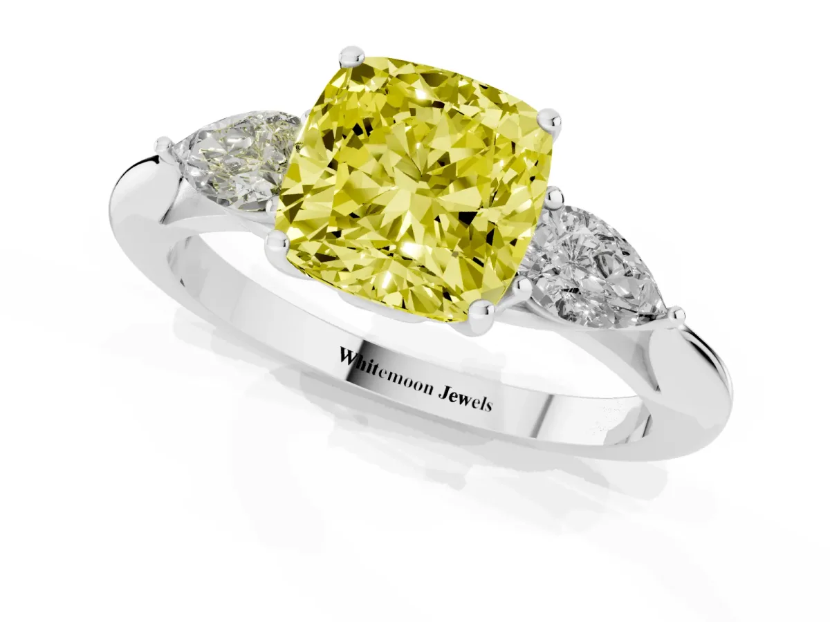 Fancy Yellow Three-Stone Cushion Cut Diamond Ring with Pear Side Stones in Four-Prong Setting Silver