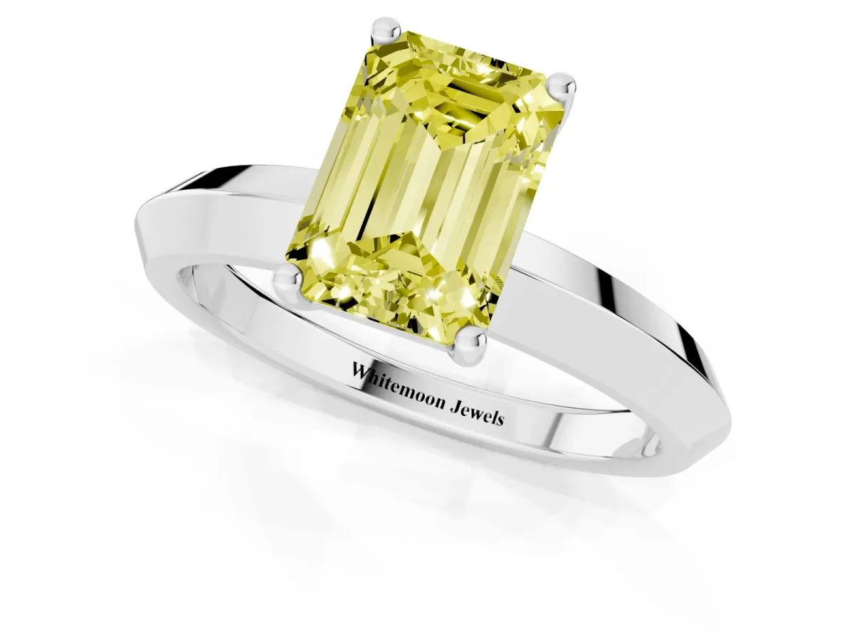 Fancy Yellow Emerald Cut Cut Solitaire Engagement Ring with Flat Band and Four-Prong Setting Silver