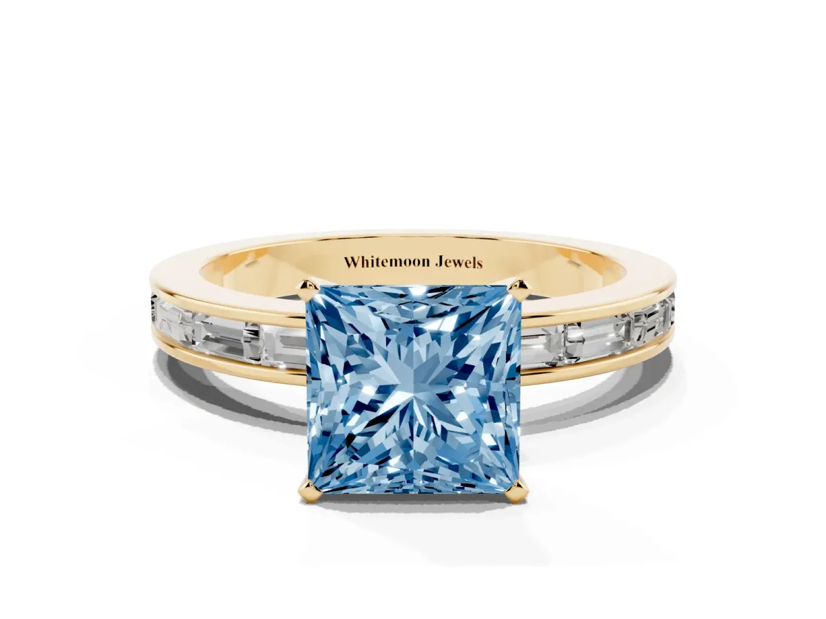 Fancy Blue Princess Cut Solitaire Diamond Ring with Channel-Set Baguette Band and Four-Prong Setting Yellow gold