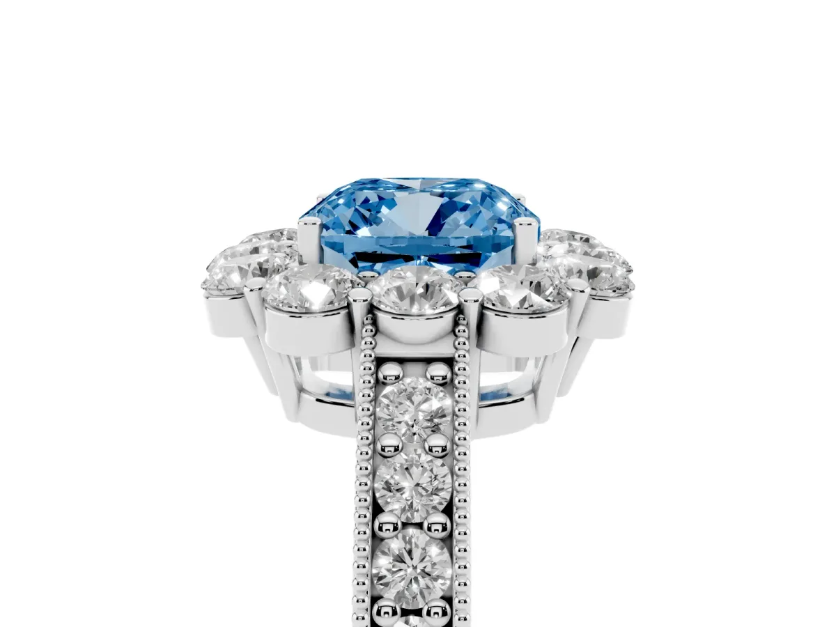Fancy Blue Cushion Cut Cut Halo Diamond Pavé Engagement Ring with Milgrain Detailing Platinum