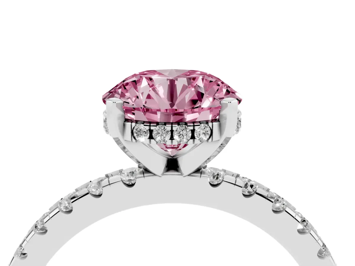 Fancy Pink Round Cut Diamond Solitaire Ring with Round Pavé Band and Four-Prong Setting Silver