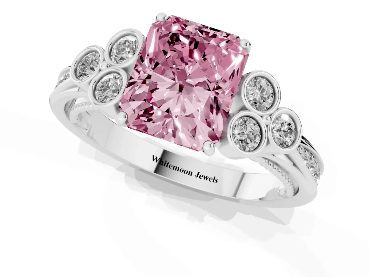 Fancy Pink Radiant Cut Cut Diamond Engagement Ring with Bezel Set Round Side Stones and Prong Setting Silver