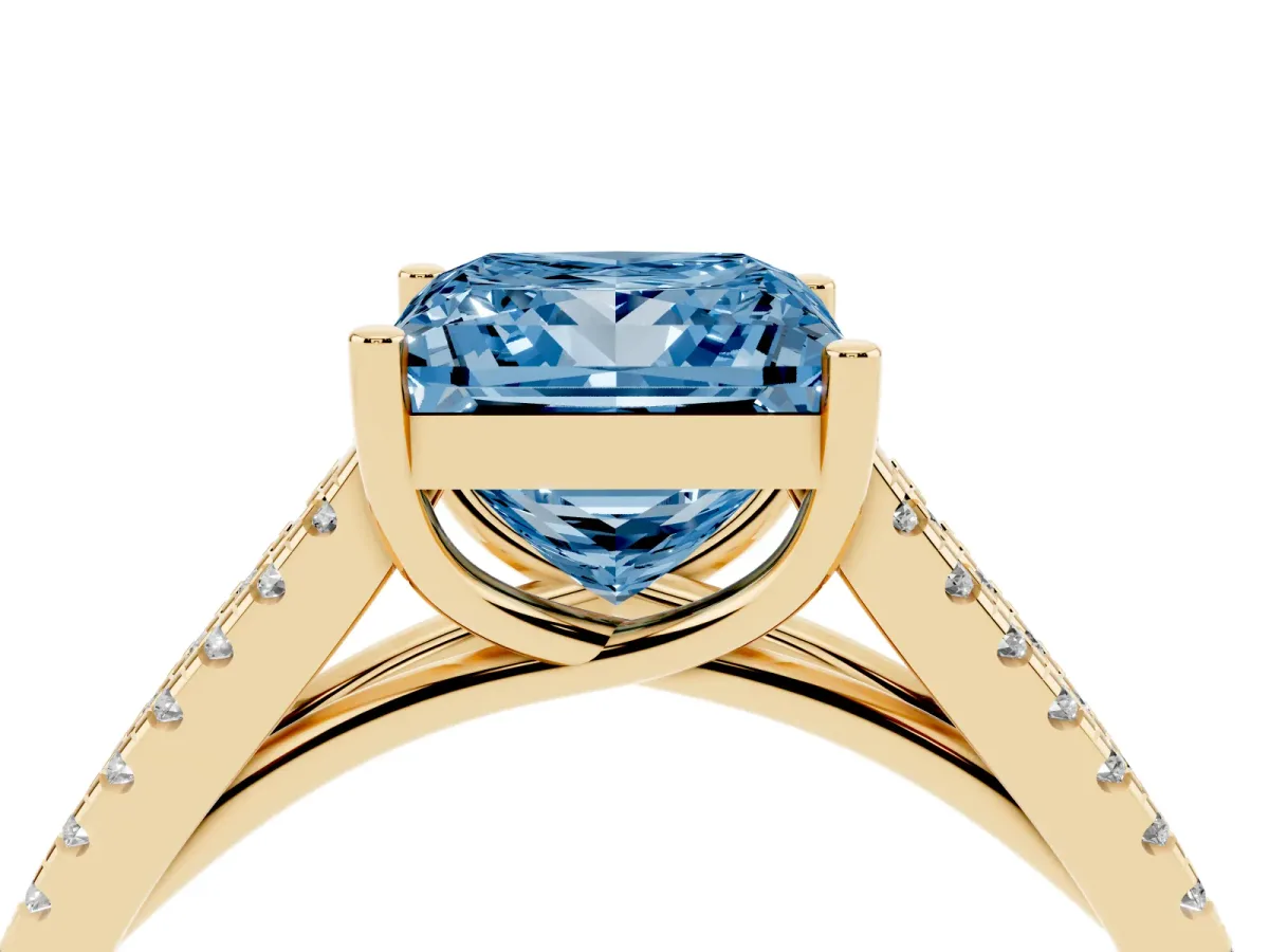 Fancy Blue Princess Cut Diamond Solitaire Engagement Ring with Split Shank Pavé Band Yellow gold
