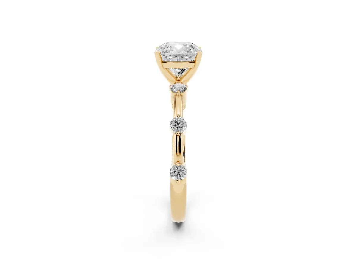 Cushion Cut Solitaire Diamond Ring with Bezel Set Side Stones and Prong Setting Yellow gold
