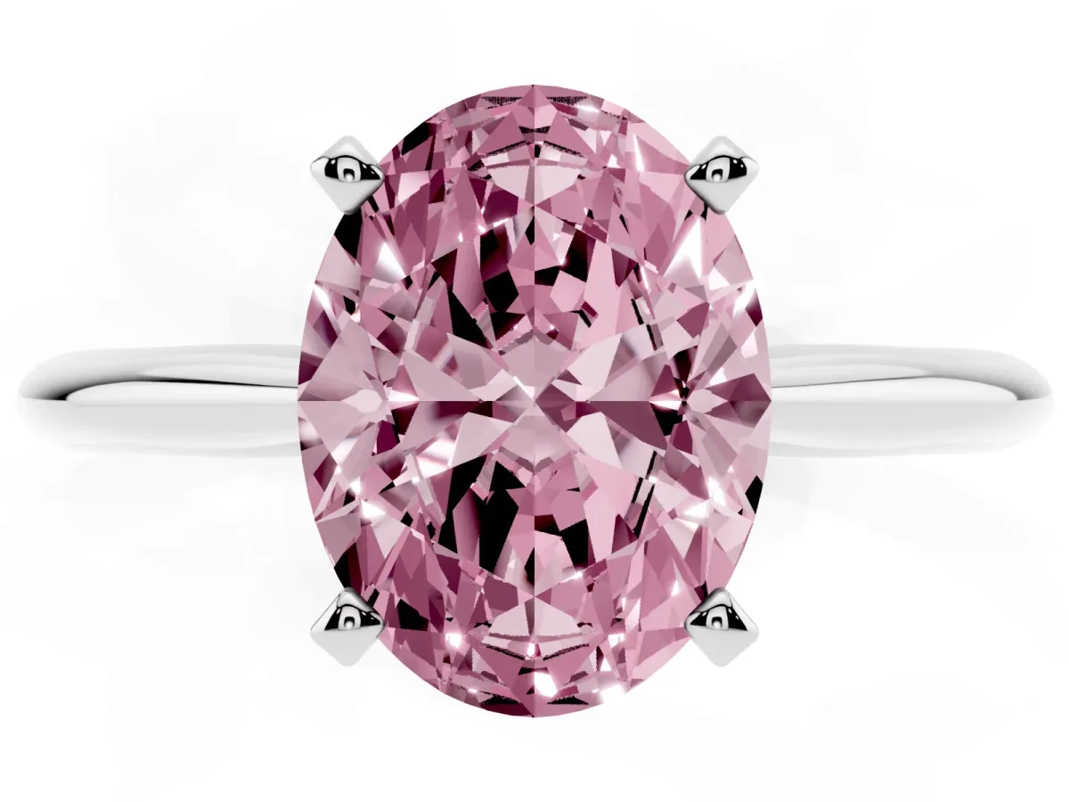 Fancy Pink Oval Cut Cut Solitaire Ring with Four-Prong Setting on a Classic Band Silver