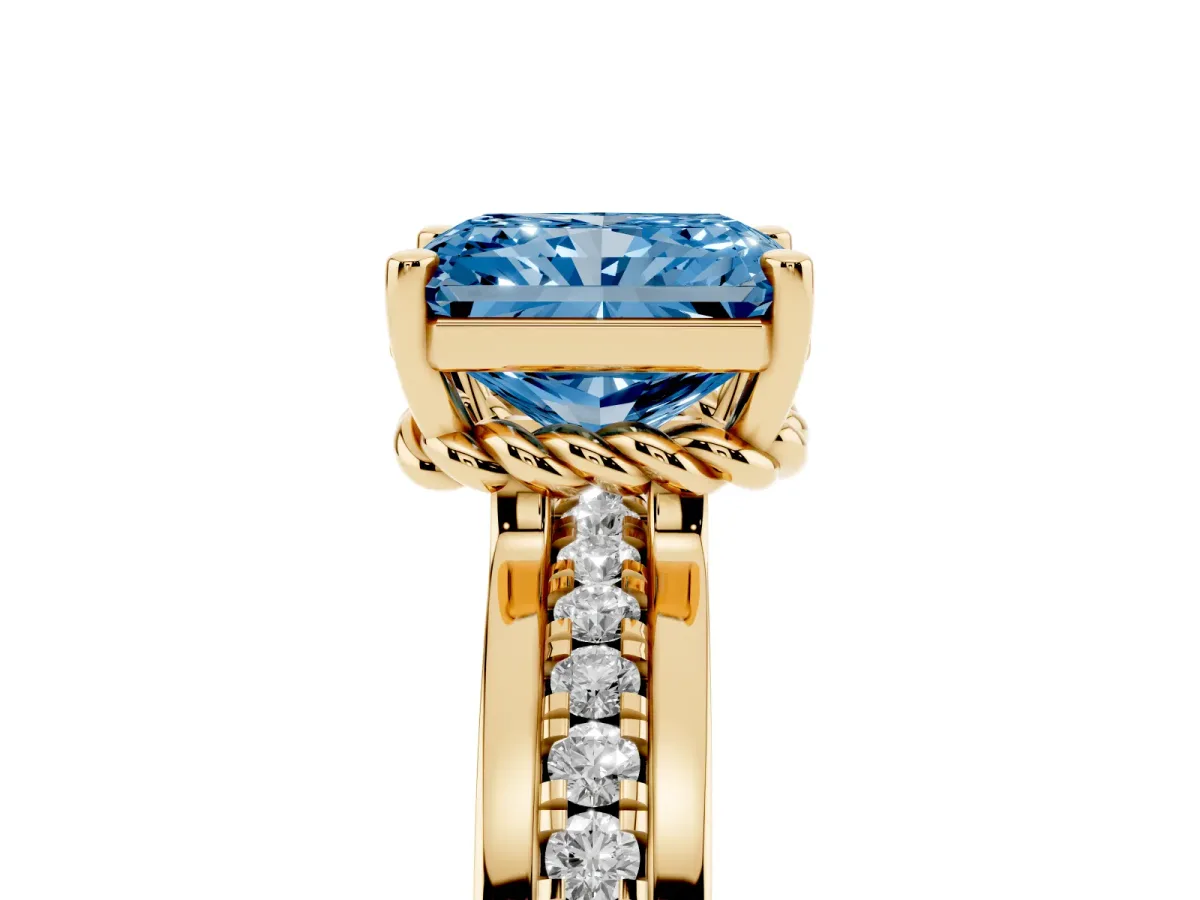 Fancy Blue Radiant Cut Solitaire Diamond Ring with Channel Set Band and Six-Prong Setting Yellow gold