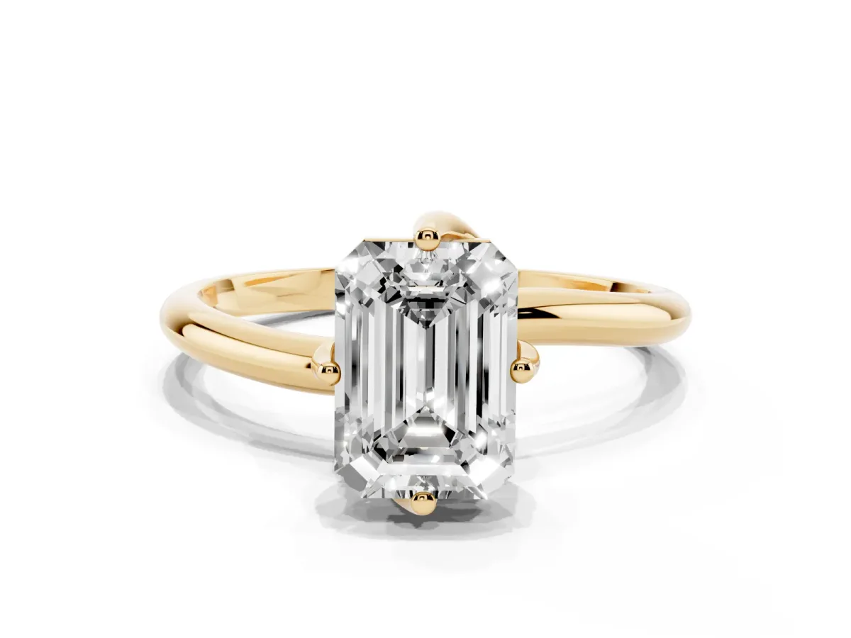 Emerald Cut Diamond Solitaire Engagement Ring with Four-Prong Setting and Classic Band Yellow gold