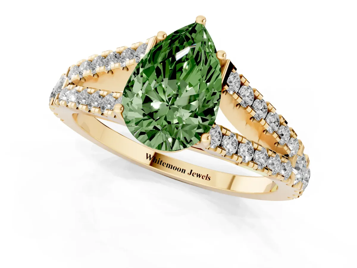 Fancy Green Pear Cut Diamond Split Shank Engagement Ring with Round Pavé and Prong Setting Yellow gold