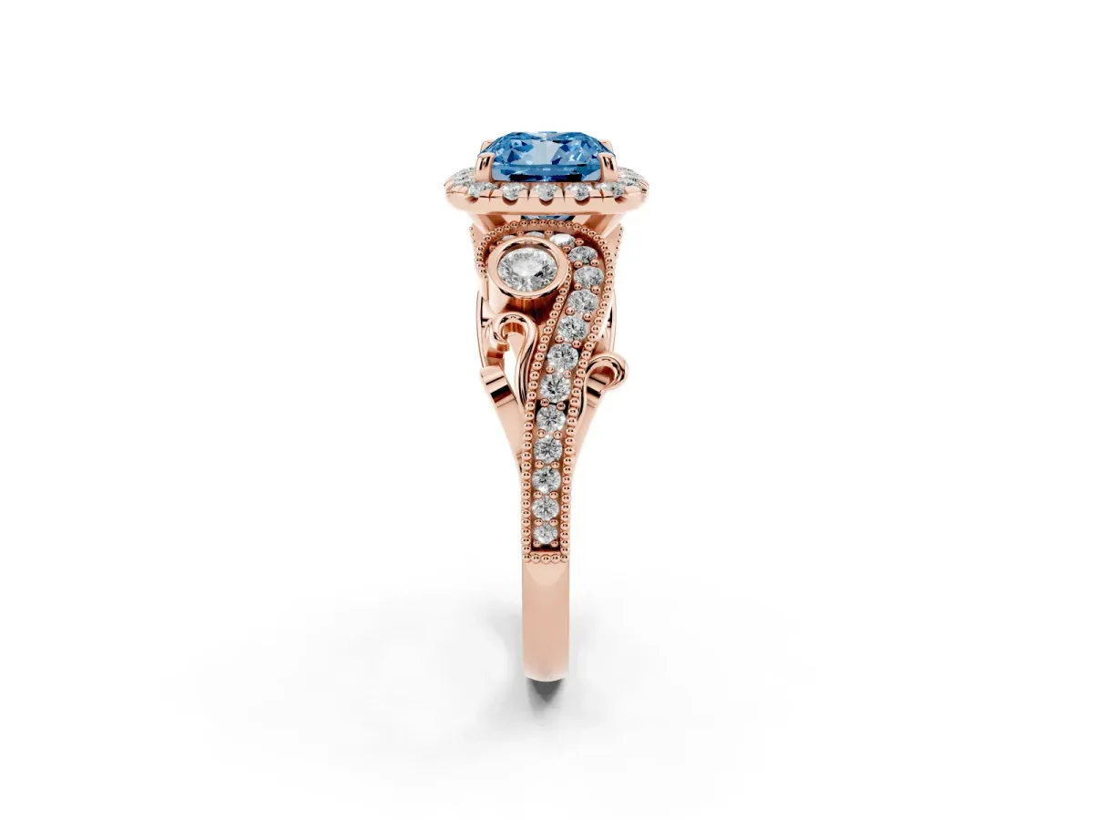 Fancy Blue Cushion Cut Halo Diamond Ring with Milgrain and Bezel Accents on a Split Shank Band Rose gold
