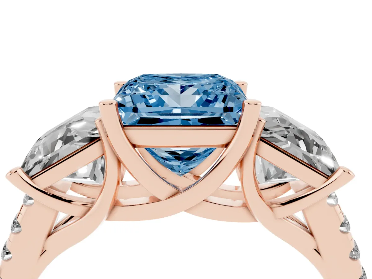 Fancy Blue Three-Stone Princess Cut Diamond Ring with Round Pavé Band and Prong Setting Rose gold