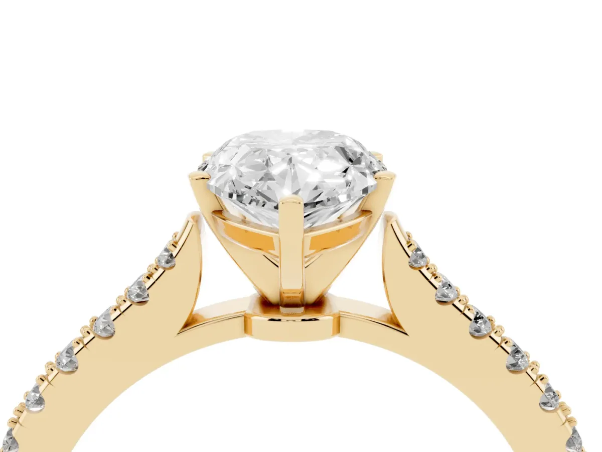 Pear Cut Cut Solitaire Diamond Engagement Ring with Pave Band and Four-Prong Setting Yellow gold