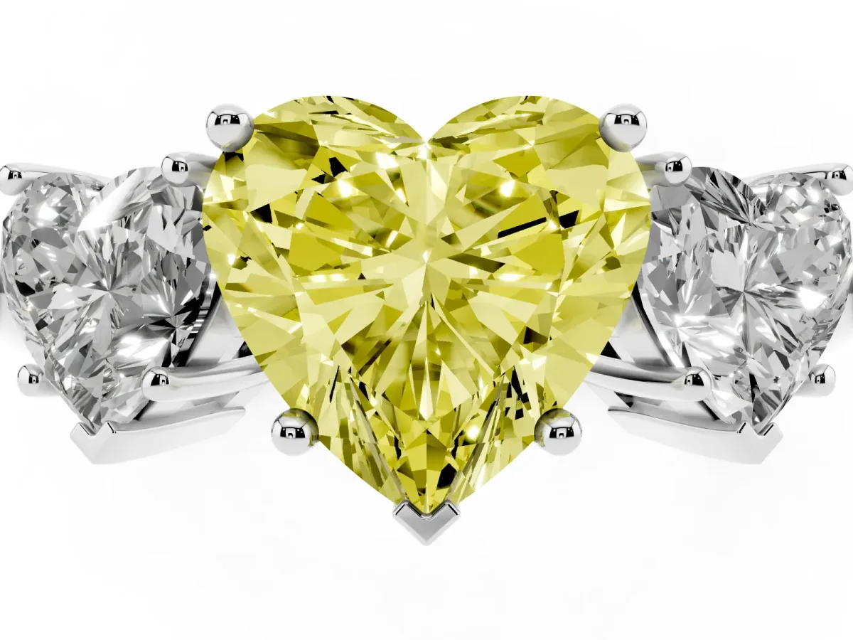 Fancy Yellow Three-Stone Heart Cut Cut Diamond Engagement Ring with Prong Setting on a White Gold Band Silver