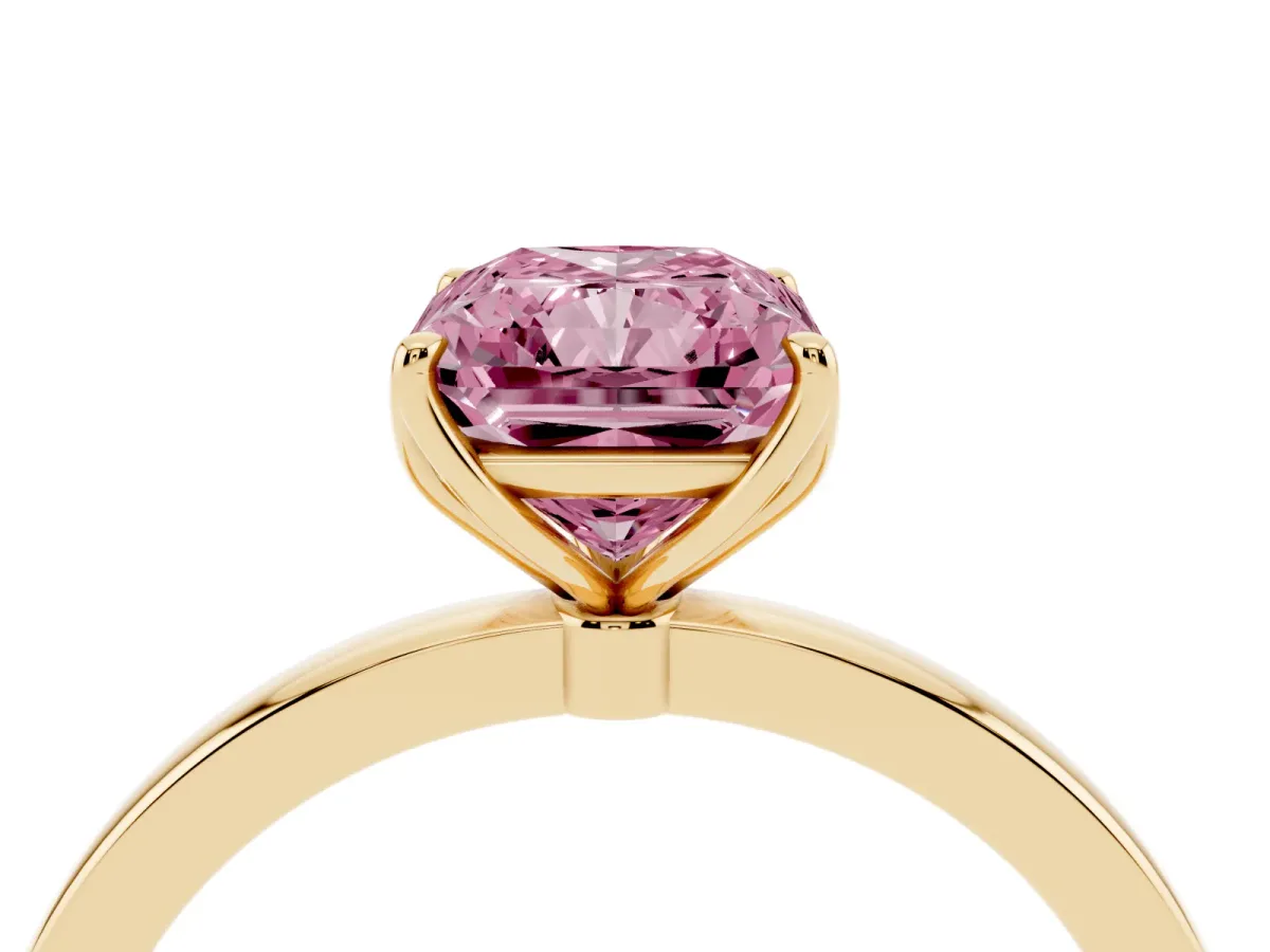 Fancy Pink Radiant Cut Diamond Solitaire Ring with Thin Band and Prong Setting Yellow gold