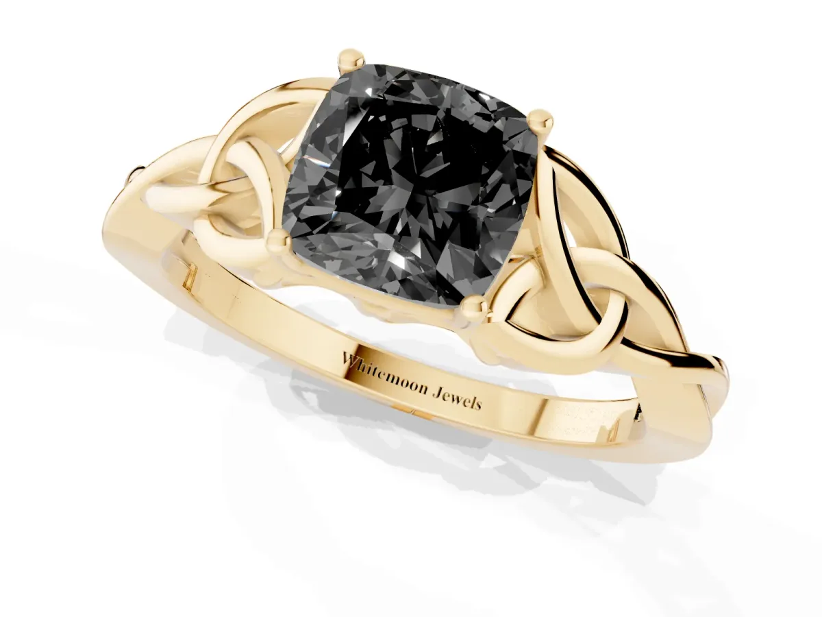 Fancy Black Cushion Cut Diamond Solitaire Engagement Ring with Celtic Knot Band and Four-Prong Setting Yellow gold