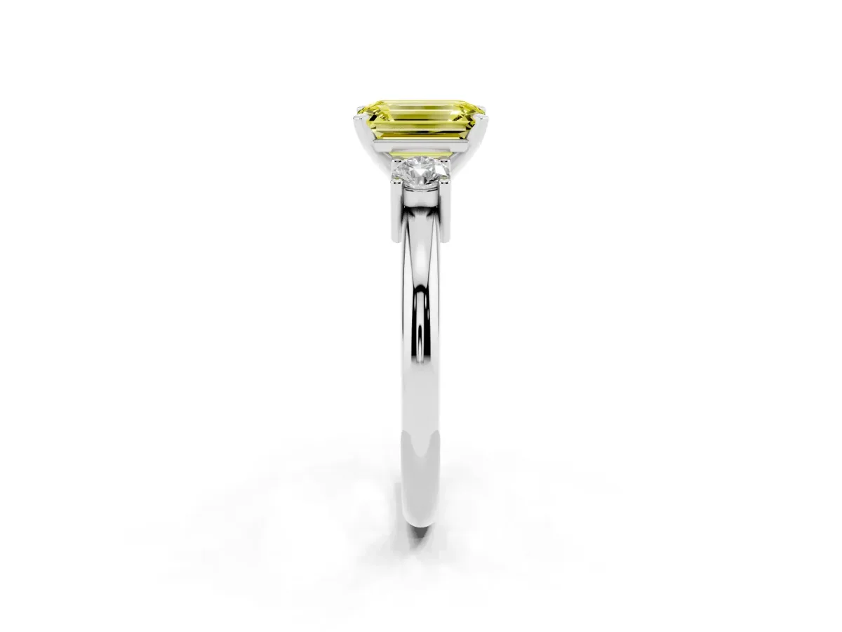 Fancy Yellow Three-Stone Emerald Cut Cut Diamond Solitaire with Prong Setting and Classic Band Silver