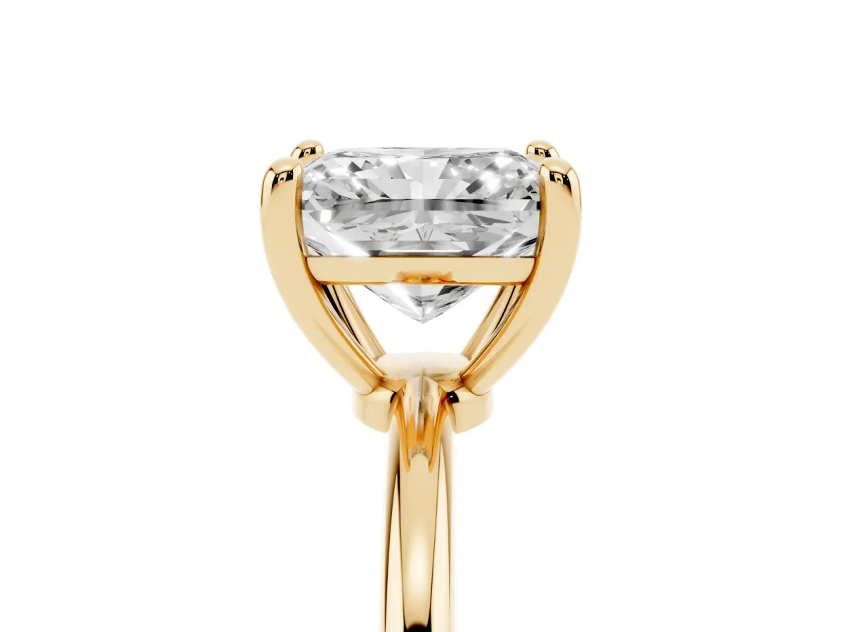 Radiant Cut Solitaire Diamond Ring with 4-Prong Setting on a Classic Band Yellow gold