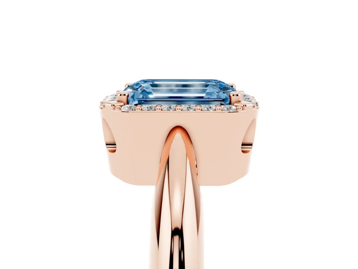 Fancy Blue Emerald Cut Cut Diamond Halo Engagement Ring with Split Shank and Four-Prong Setting Rose gold