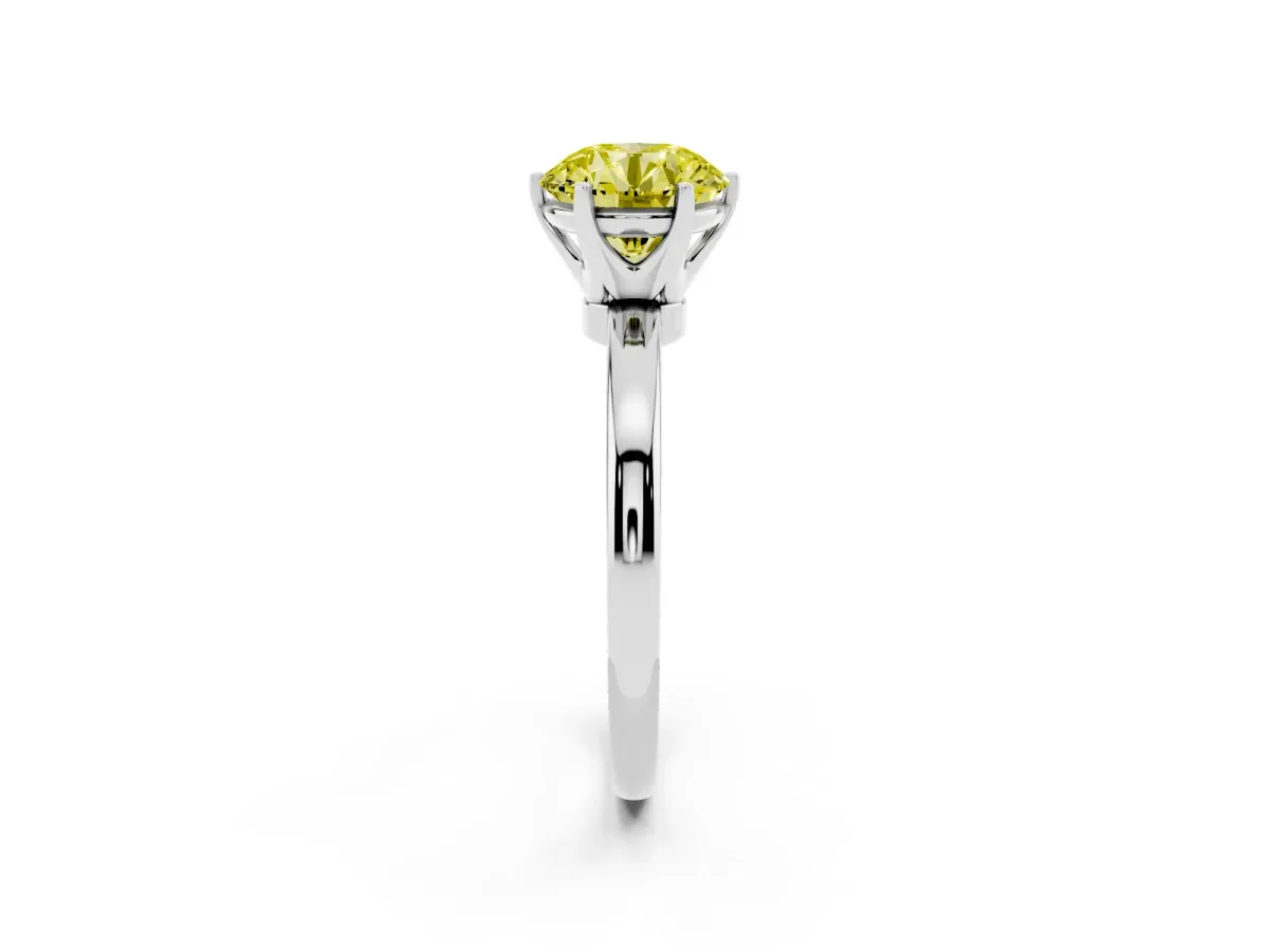 Fancy Yellow Round Cut Solitaire Diamond Ring with Six-Prong Setting on a Classic Band Silver