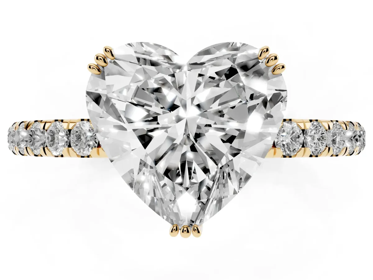 Heart Cut Brilliant Solitaire with Pavé Band and Claw Prong Setting Yellow gold