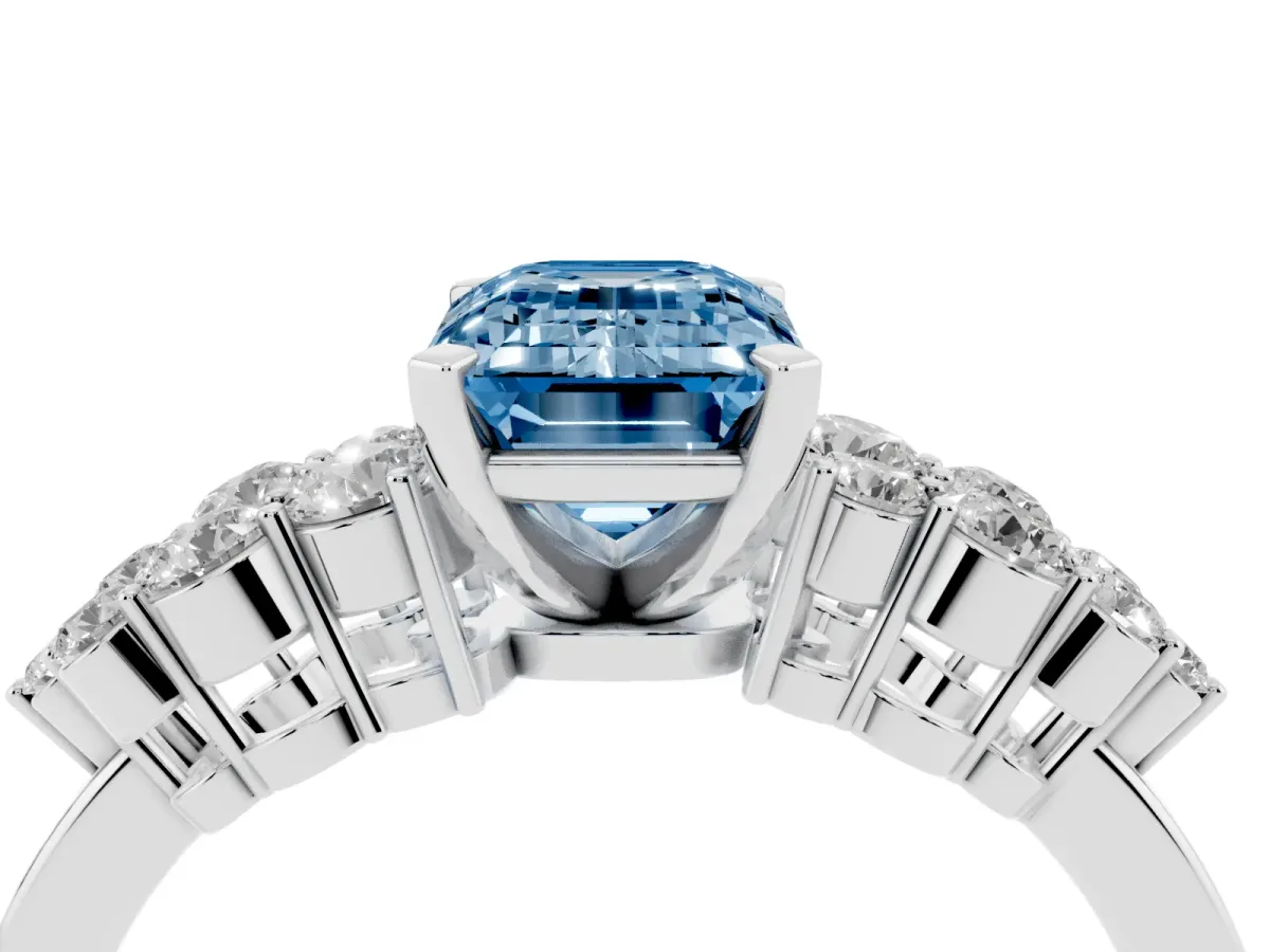 Fancy Blue Emerald Cut Cluster Diamond Engagement Ring with Pavé Band and Four-Prong Setting Silver