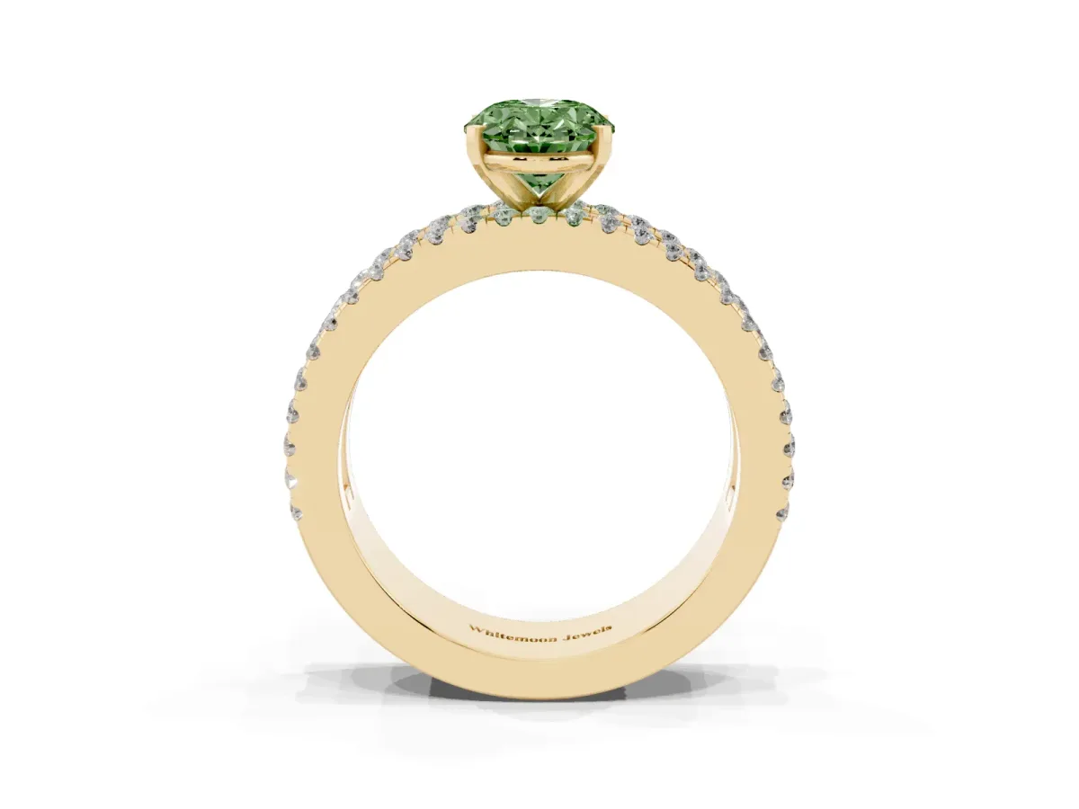 Fancy Green Oval Cut Diamond Solitaire Ring with Pavé and Channel Set Band Yellow gold